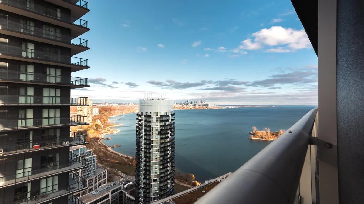 Panoramic view of Lake Ontario and Downtown Toronto skyline from the 34th floor at 56 Annie Craig Dr #3408.