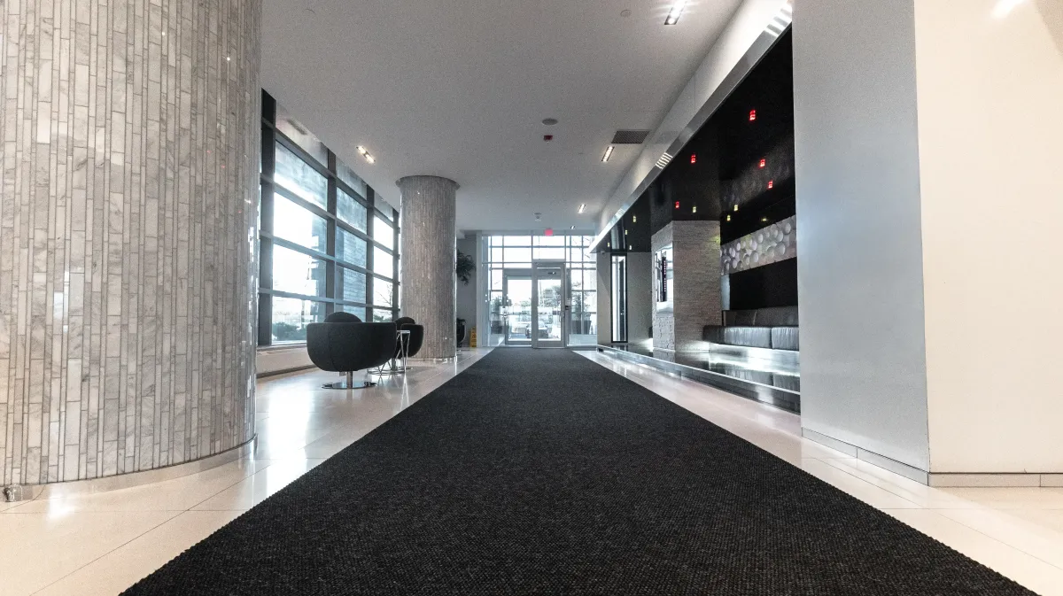 24-hour concierge and practical lobby entrance at 56 Annie Craig Dr #3408 in Mimico Waterfront.