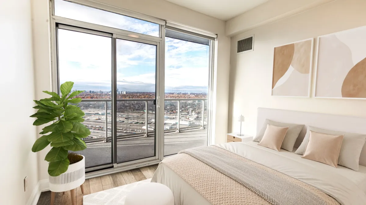 Primary bedroom at 56 Annie Craig Dr #3408 featuring a generous walk-in closet and sun-filled windows.