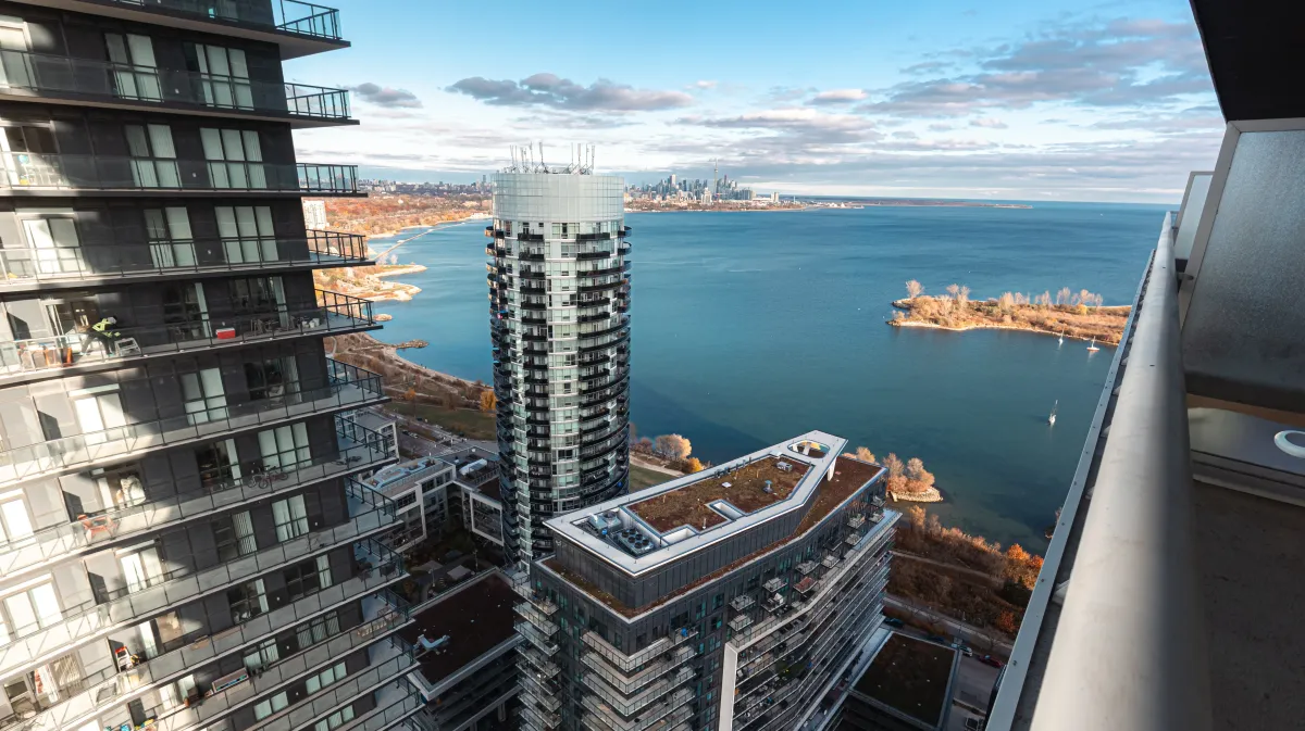 Panoramic view of Lake Ontario and Downtown Toronto skyline from the 34th floor at 56 Annie Craig Dr #3408.