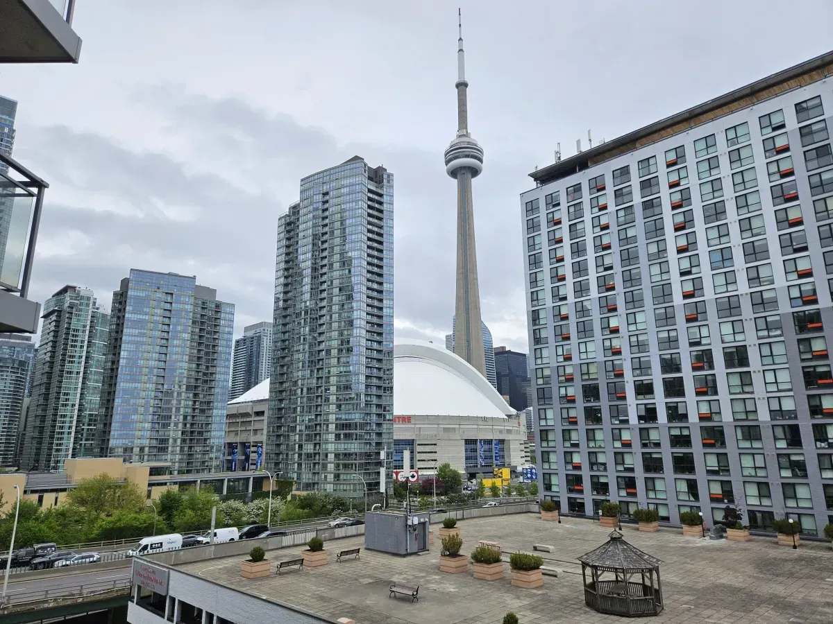 Breathtaking view of the CN Tower and downtown Toronto skyline from the 8th floor of 410 Queens Quay W.