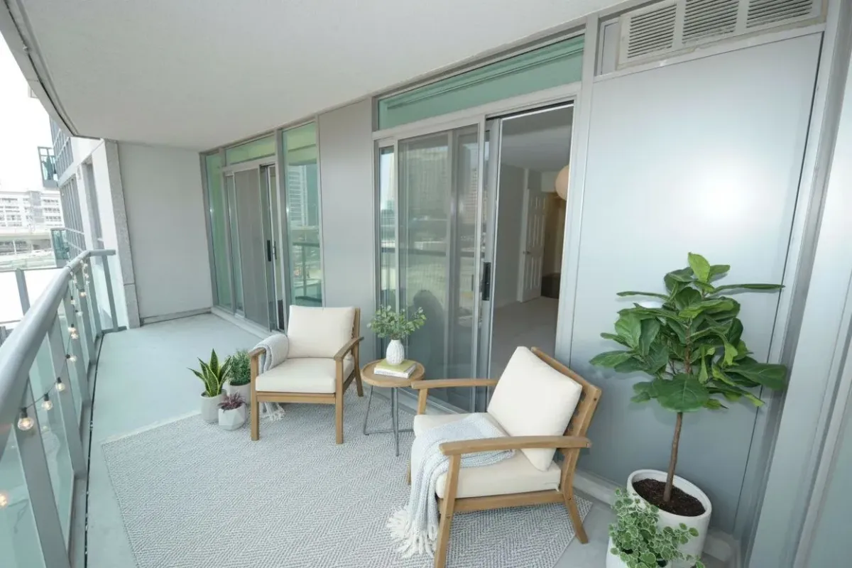 Private outdoor balcony space perfect for seating at 30 Grand Trunk Crescent Unit 509 Toronto.