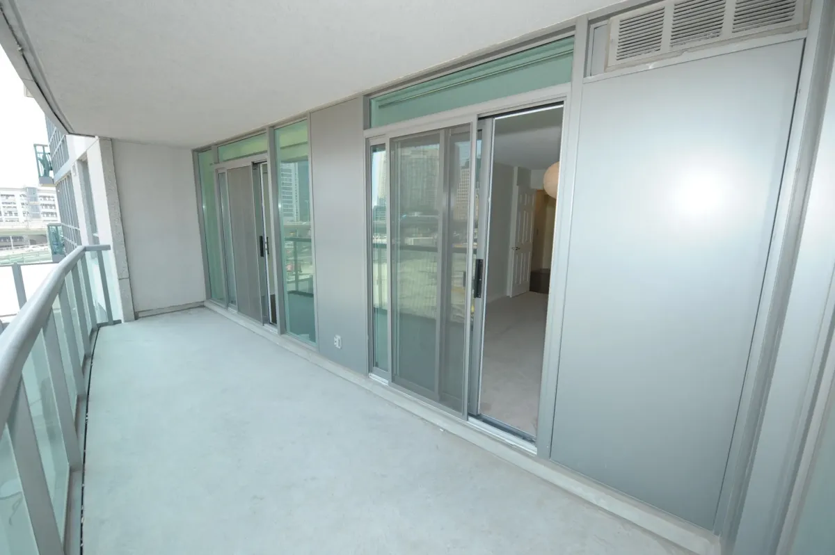 Private outdoor balcony space perfect for seating at 30 Grand Trunk Crescent Unit 509 Toronto.