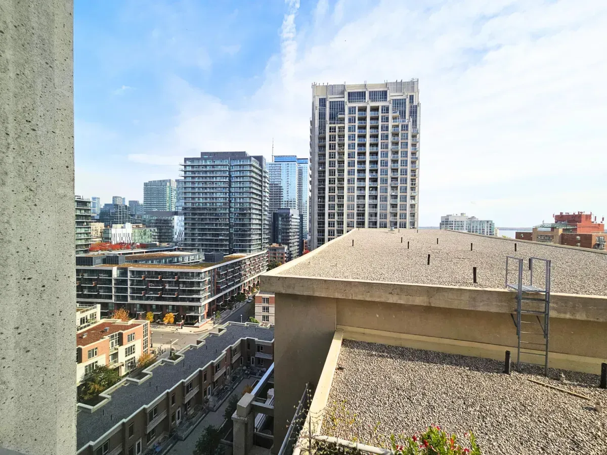 Glass-enclosed private balcony at 628 Fleet St #1311 overlooking the historic Fort York district.