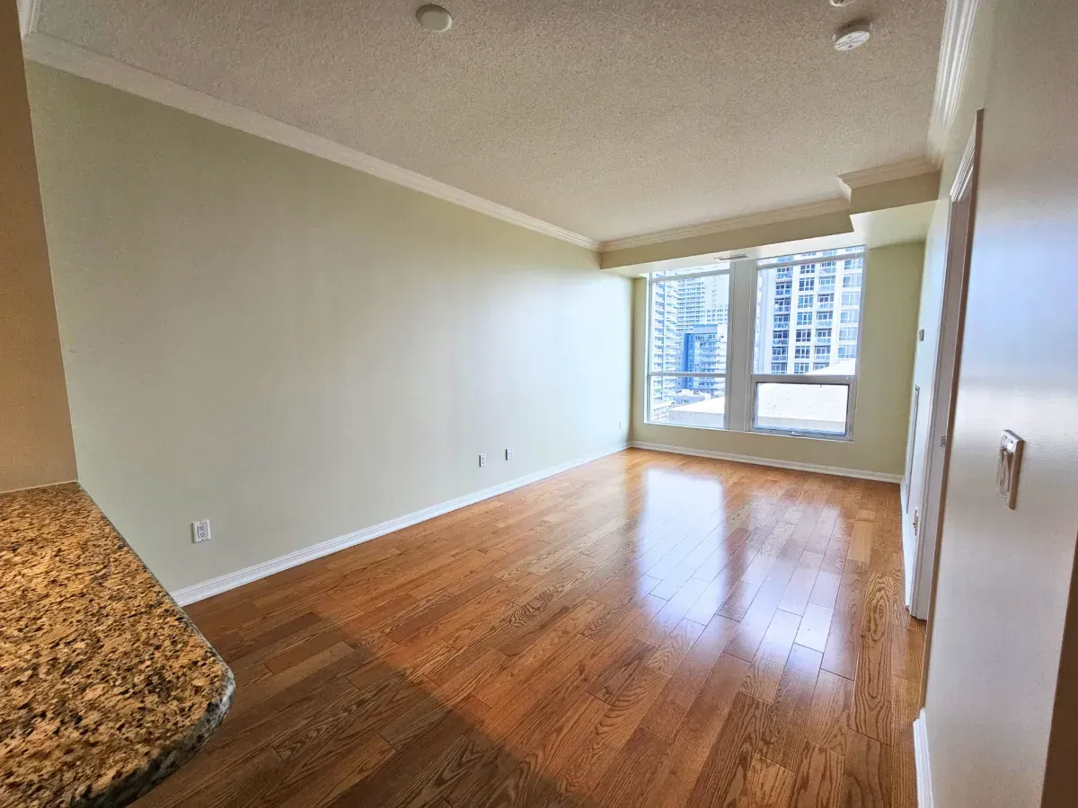 Spacious 1-bedroom suite layout in Toronto's Fort York neighborhood with neutral tones and natural light.