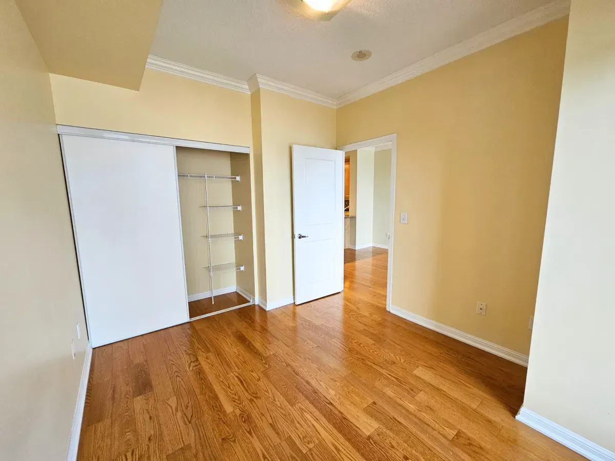 Tranquil 1-bedroom sanctuary at 628 Fleet St with hardwood floors and sliding glass door access to the balcony.