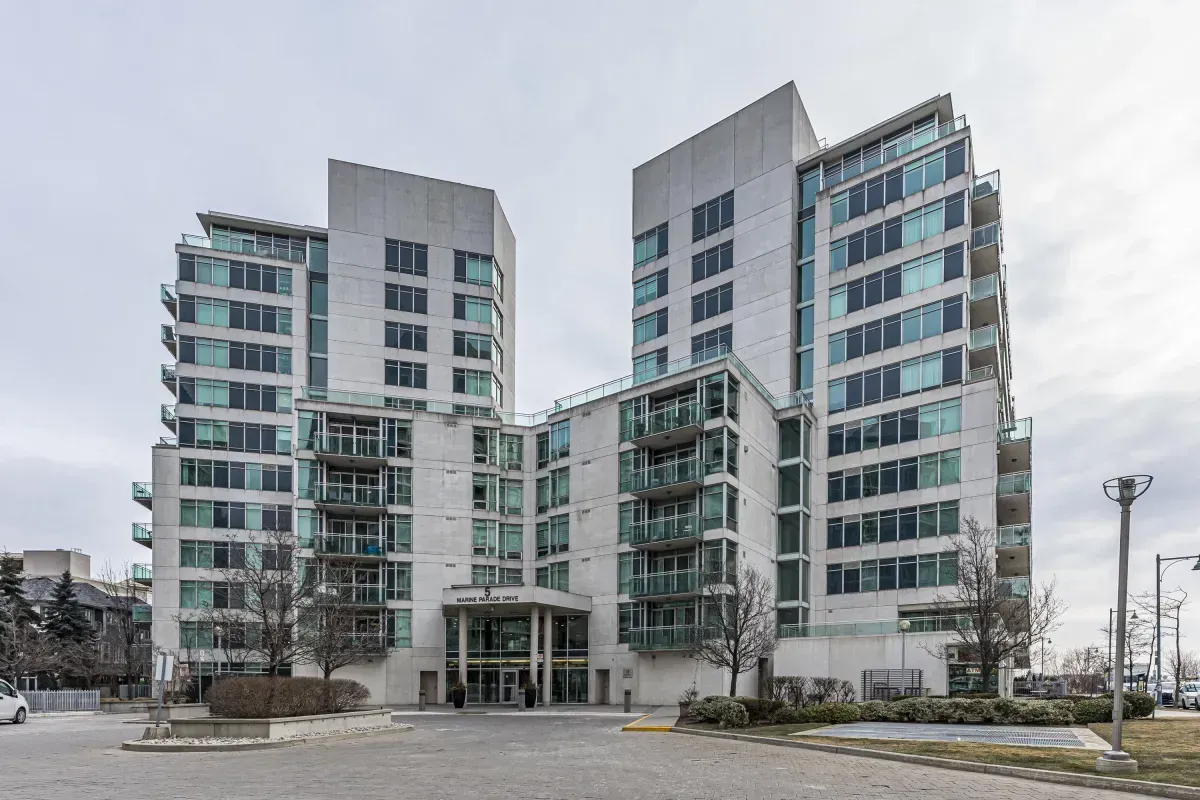 The modern glass and brick exterior of Grenadier Landing located at 5 Marine Parade Dr #630, Etobicoke.