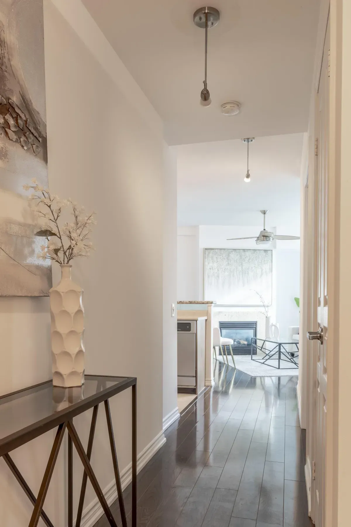 Elegant hallway at 5 Marine Parade Dr #630, Etobicoke, leading into the bright, open-concept living area.