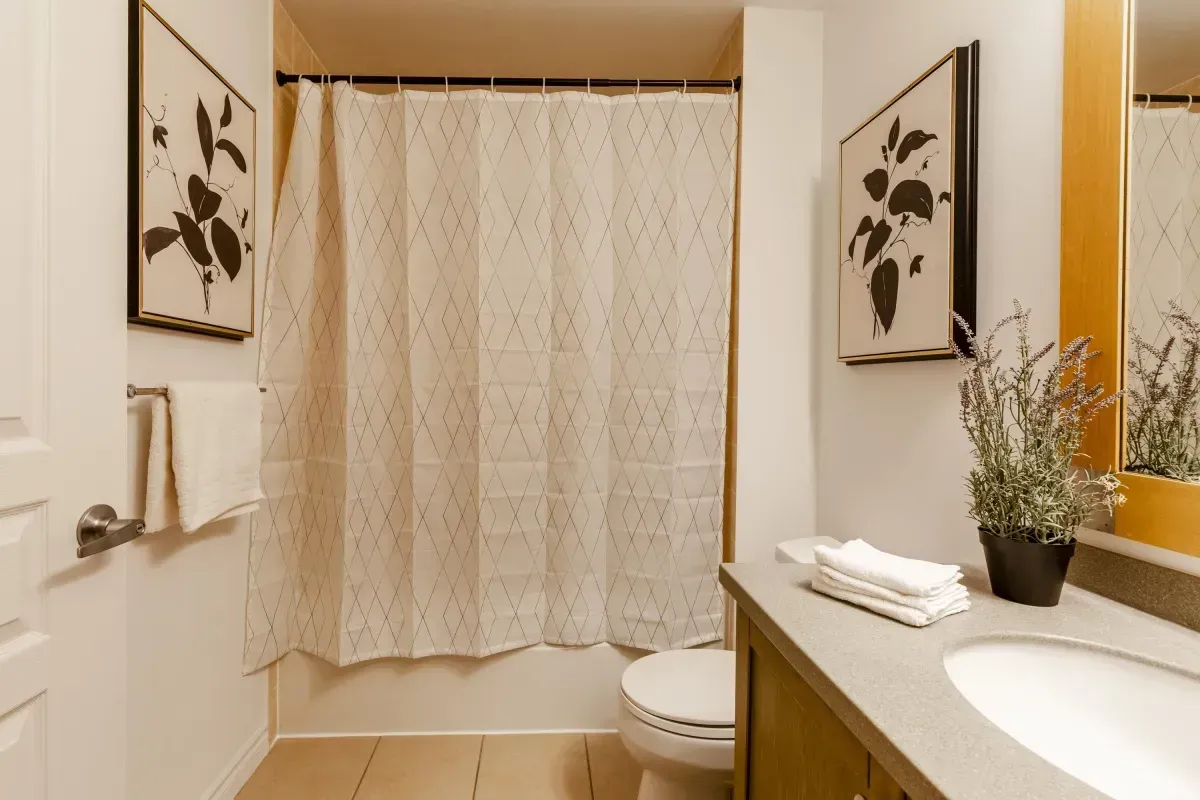 Clean and spacious 4-piece bathroom at 5 Marine Parade Dr #630, Etobicoke, with a large vanity and integrated shower/tub.