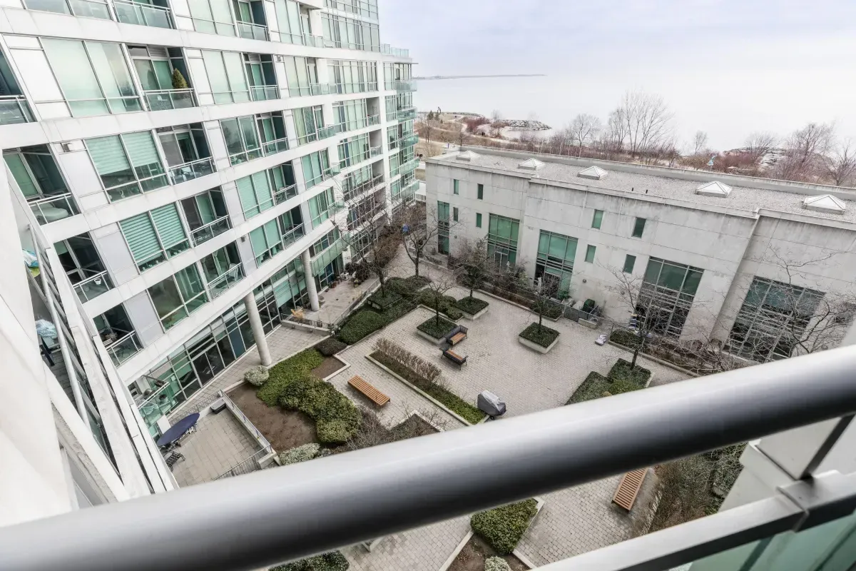 Stunning perspective of the central courtyard and neighboring architecture from the balcony of 5 Marine Parade Dr #630, Etobicoke.