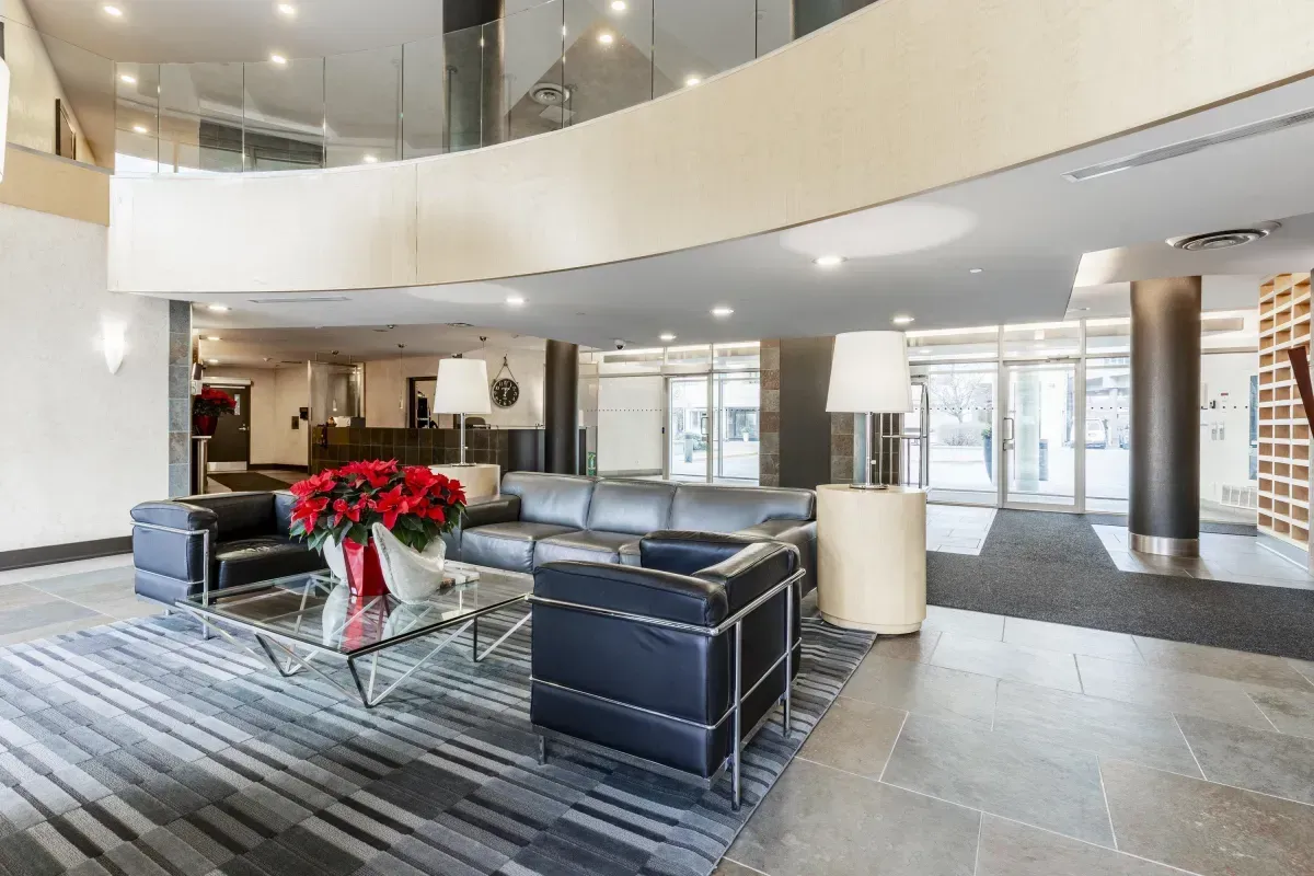 Sophisticated building lobby with designer seating and high ceilings at 5 Marine Parade Dr #630, Etobicoke.