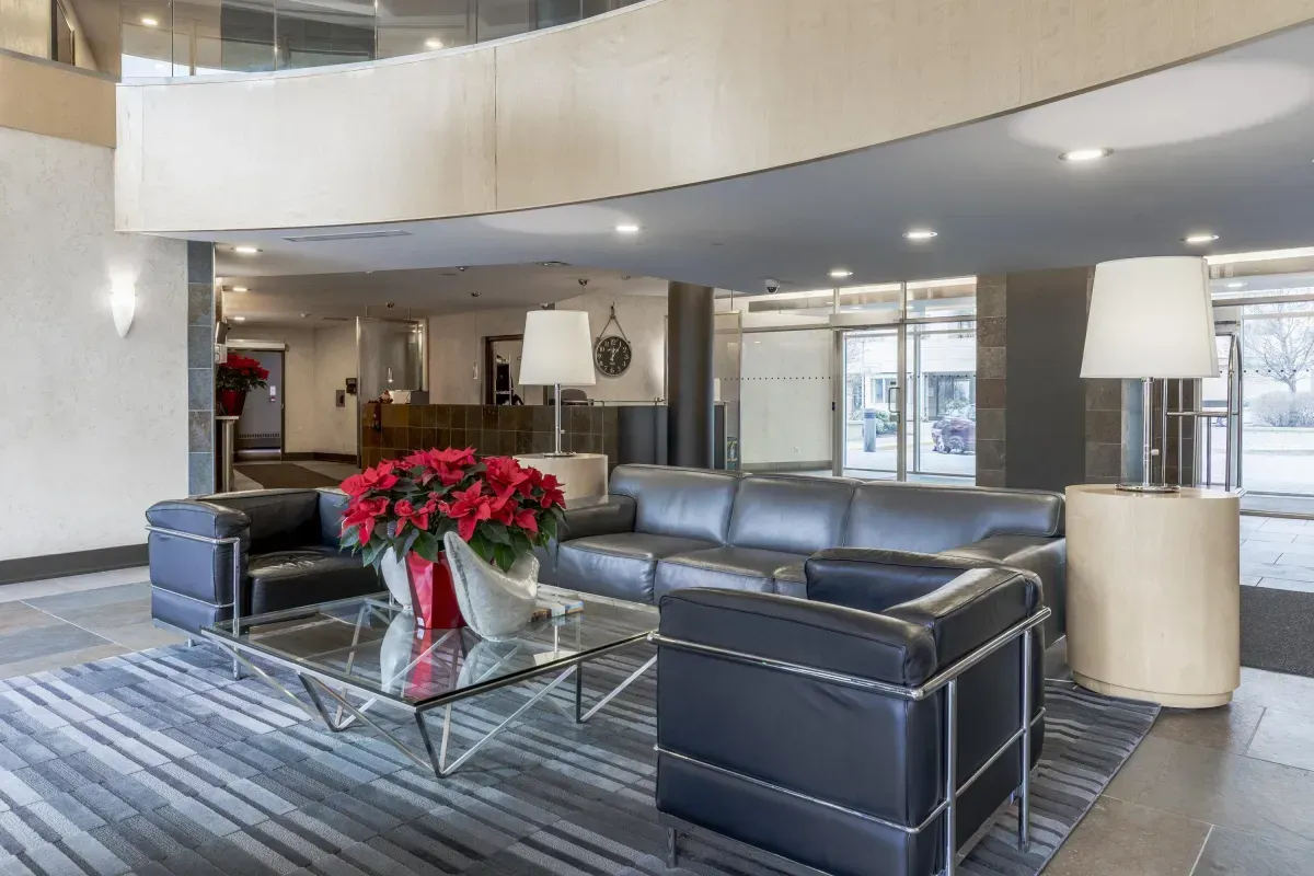 Sophisticated building lobby with designer seating and high ceilings at 5 Marine Parade Dr #630, Etobicoke.