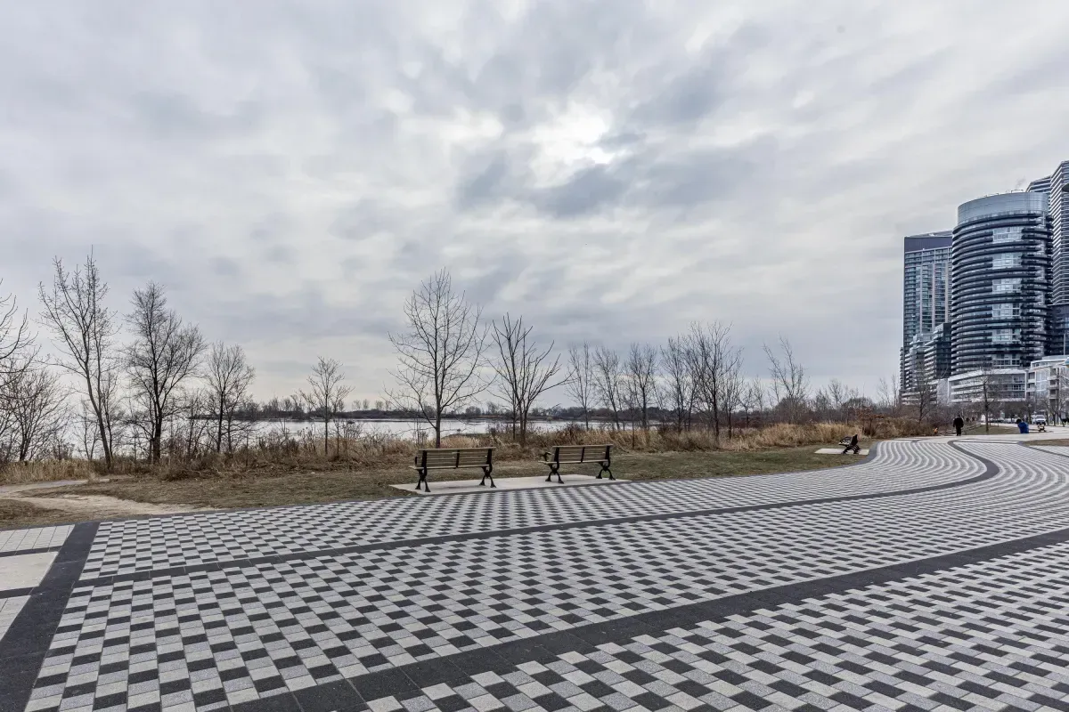 Clean and well-lit common area corridor leading to 5 Marine Parade Dr #630, Etobicoke.