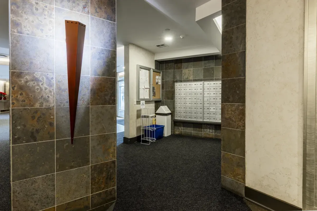 Sophisticated building lobby with designer seating and high ceilings at 5 Marine Parade Dr #630, Etobicoke.