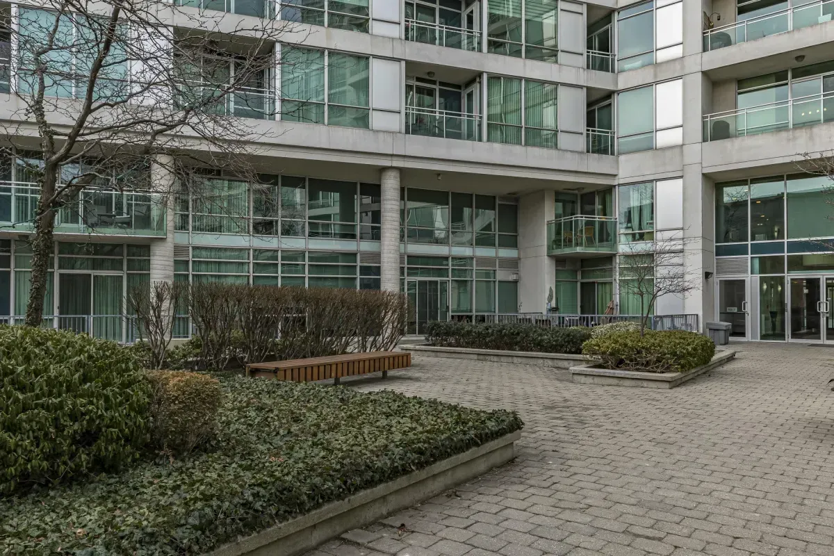Clean and well-lit common area corridor leading to 5 Marine Parade Dr #630, Etobicoke.