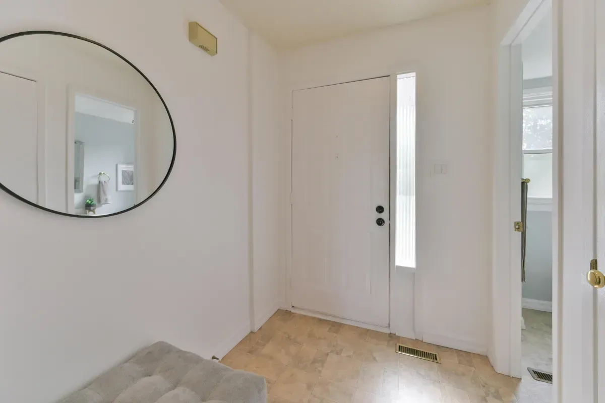 Bright and airy entrance foyer with a neutral palette and direct sightlines at 2286 Margot St, Oakville.
