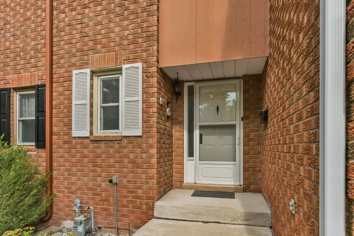 Covered front porch and main entry door of the 3+1 bedroom home at 2286 Margot St, Oakville.