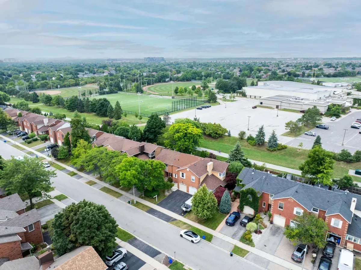 A bird's-eye view of the quiet, tree-lined street and residential pocket surrounding 2286 Margot St, Oakville.