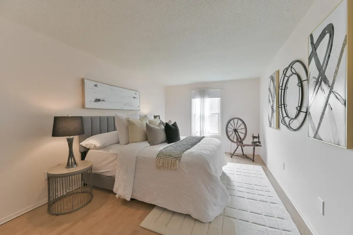 Spacious primary suite at 2286 Margot St, Oakville, featuring a large window and neutral decor.