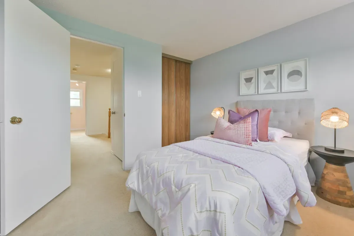 Well-appointed second and third bedrooms at 2286 Margot St, Oakville, ideal for children or a home office.