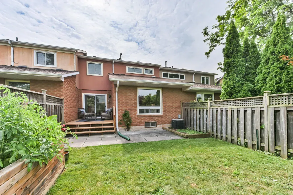 Fully fenced, private backyard sanctuary at 2286 Margot St, Oakville, featuring a patio area for outdoor entertaining.