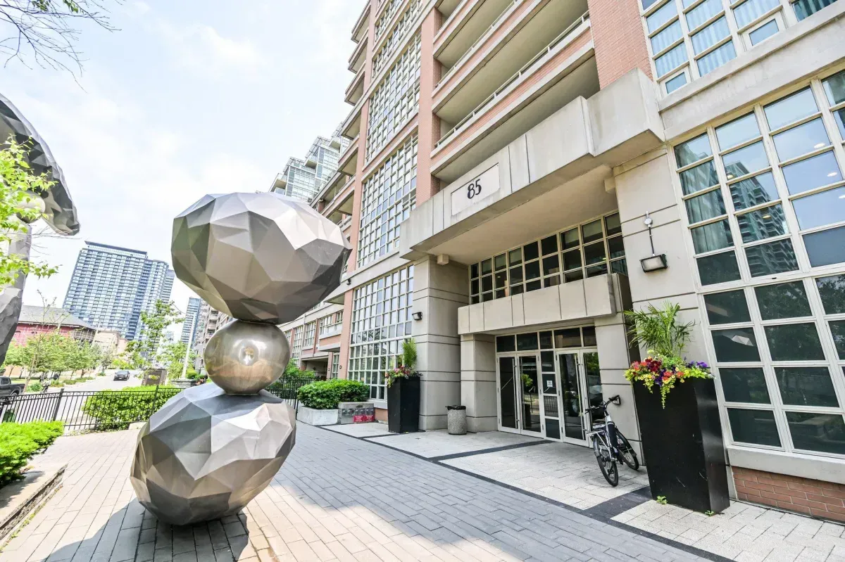 High-rise glass tower at King West Condominiums, 85 E Liberty St, Liberty Village, Toronto.