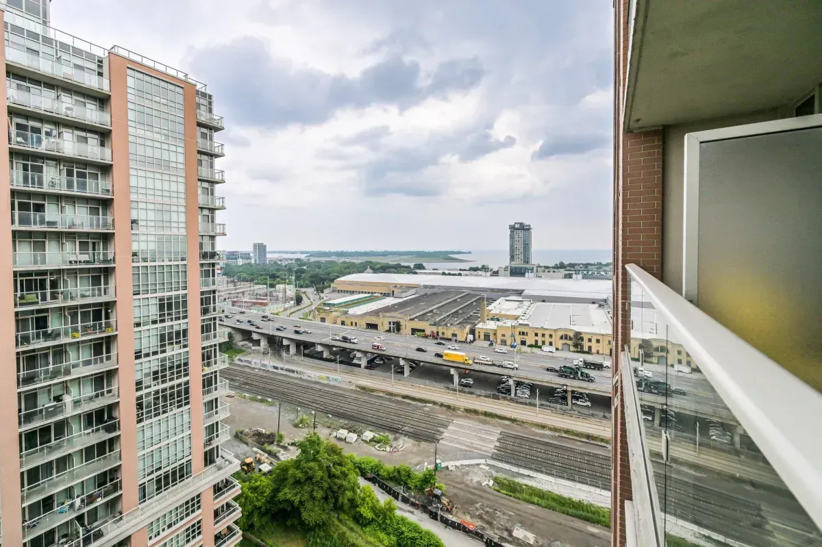 Unobstructed Southeast view of Lake Ontario, BMO Field, and Exhibition Place from the 19th floor.