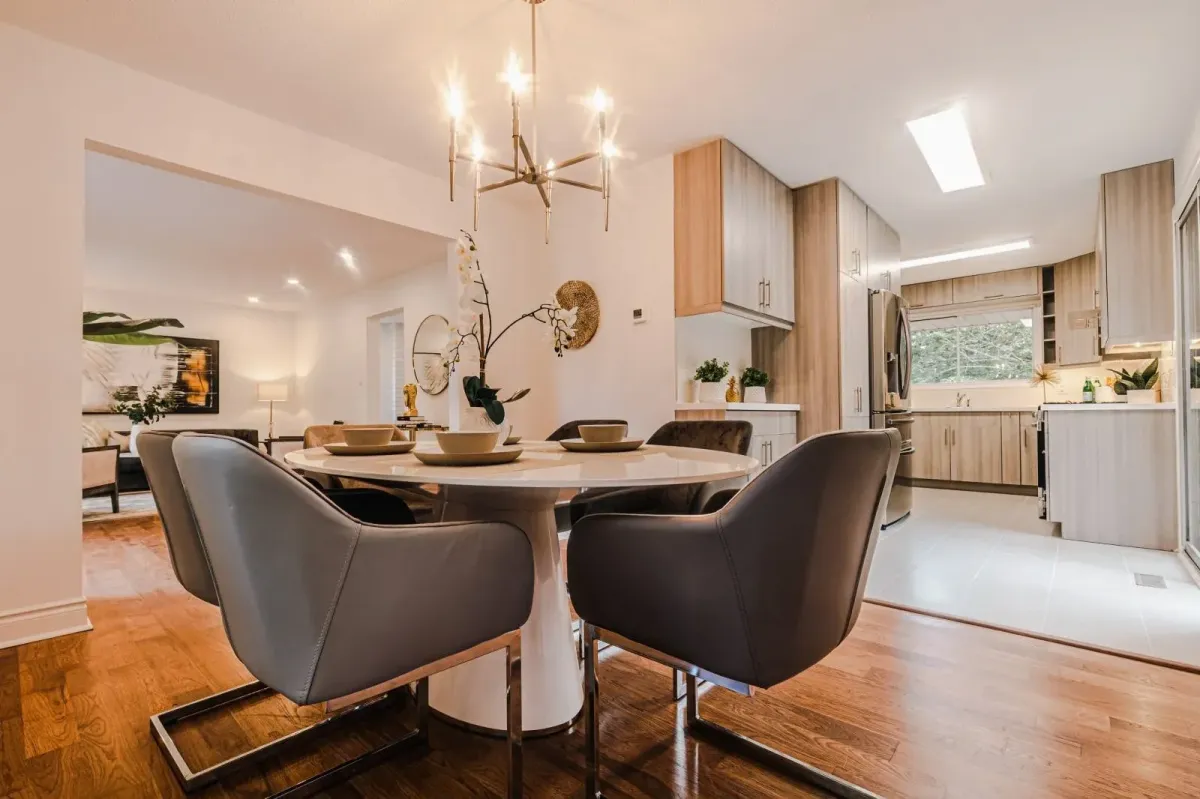 View from the dining room at 110 Holliday Dr looking into the open-concept kitchen and living space.