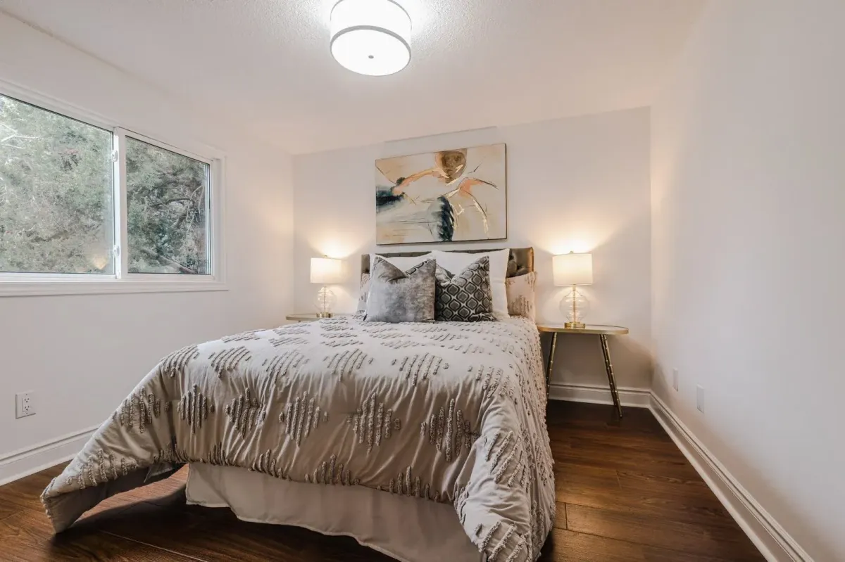 Third bedroom at 110 Holliday Dr featuring a neutral color scheme and large closet for a growing family.