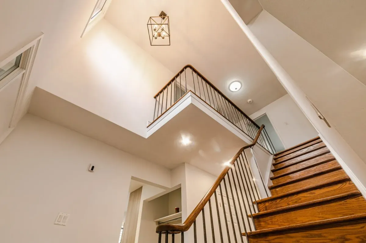 View from the second-floor landing at 110 Holliday Dr overlooking the bright, open-concept foyer.