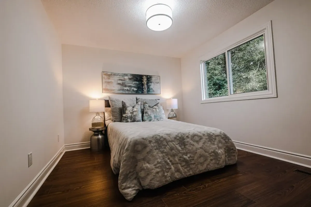 One of the two additional bedrooms at 110 Holliday Dr in the fully finished basement.