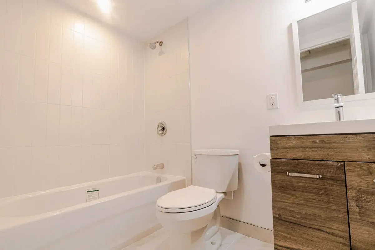 Basement 3-piece bathroom at 110 Holliday Dr with a modern vanity and walk-in shower.
