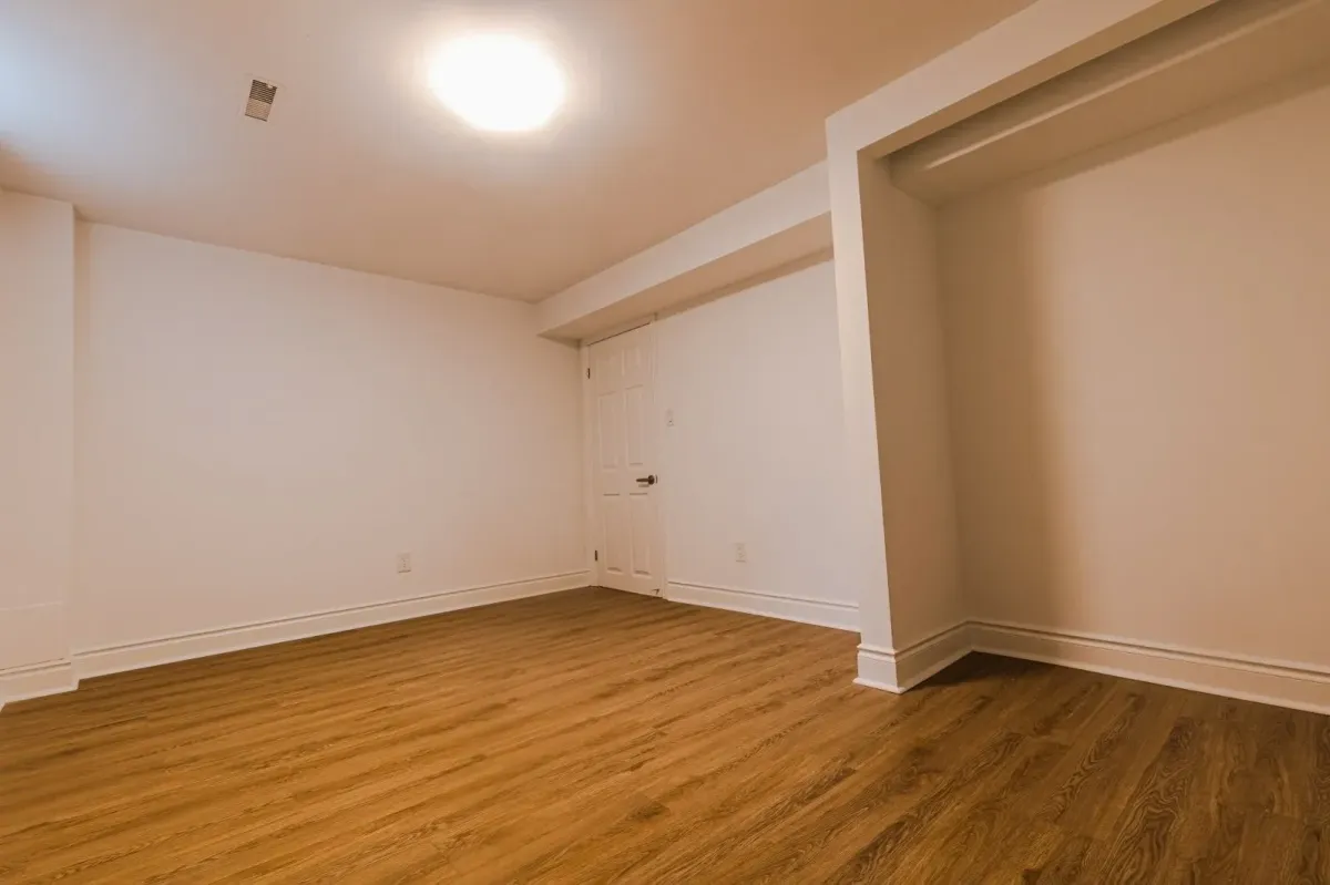 Secondary view of the basement rec room at 110 Holliday Dr, ideal for a home theater or play area.
