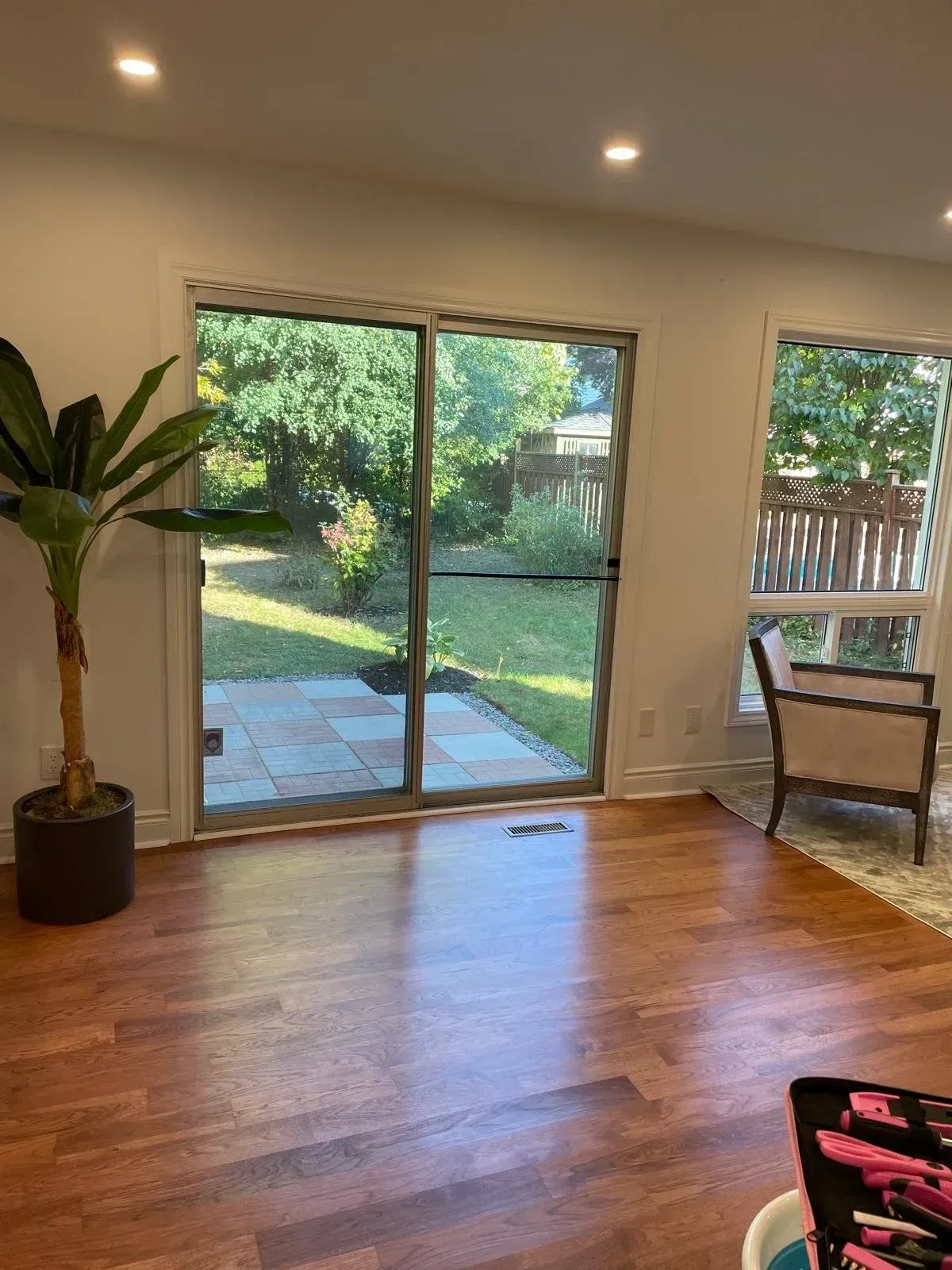 Sun-drenched breakfast area at 110 Holliday Dr with a double-door sliding glass walk-out to the backyard patio.