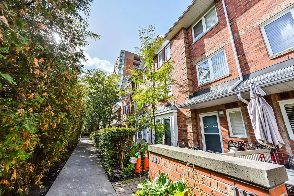 Stone walkway and private garden entrance at 900 Steeles Ave W #112, Vaughan.