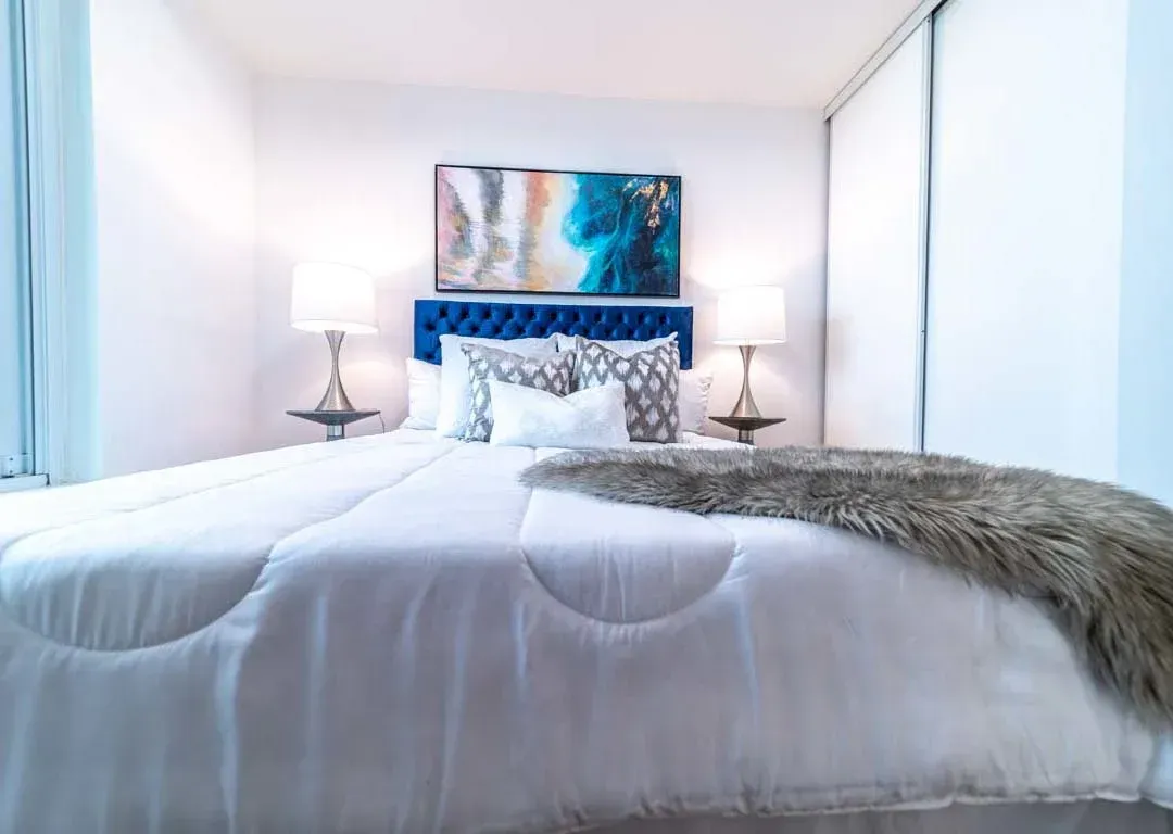 View of the primary retreat at 235 Sherway Gardens Rd #401, highlighting the floor-to-ceiling windows.