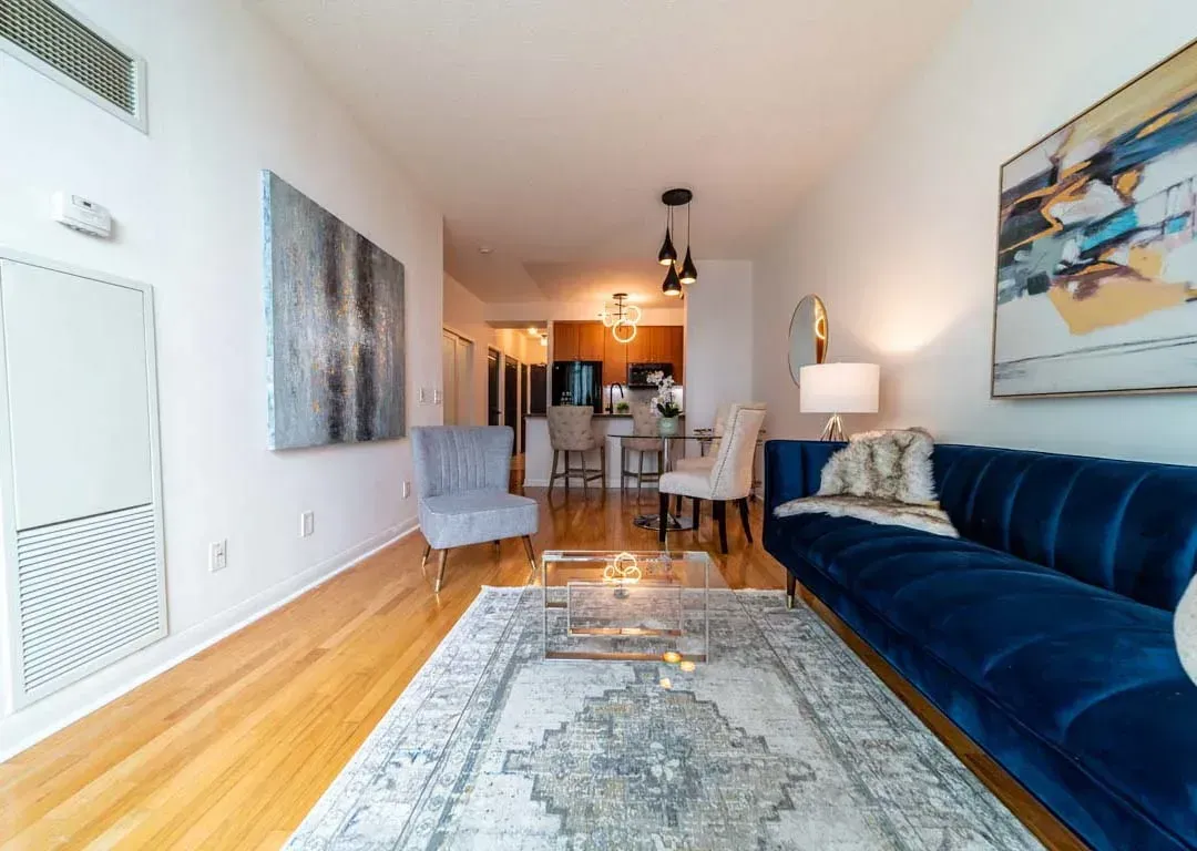 Expansive view of the living and dining space at 235 Sherway Gardens Rd #401, highlighting the 9-foot ceilings.
