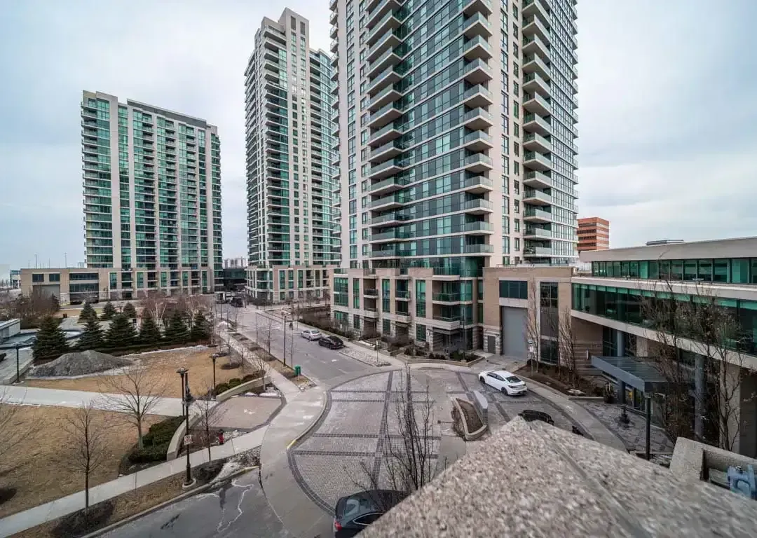 View of the building entrance and drop-off area at 235 Sherway Gardens Rd.