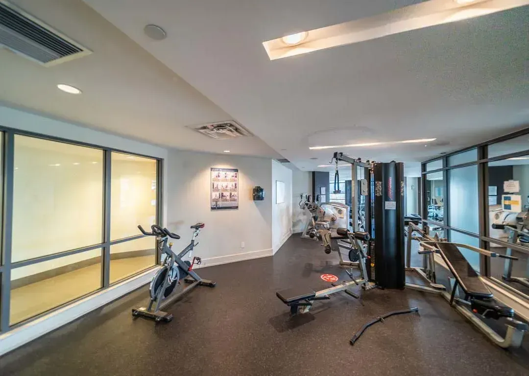 On-site fitness centre at 235 Sherway Gardens Rd showing high-end cardio equipment for residents.