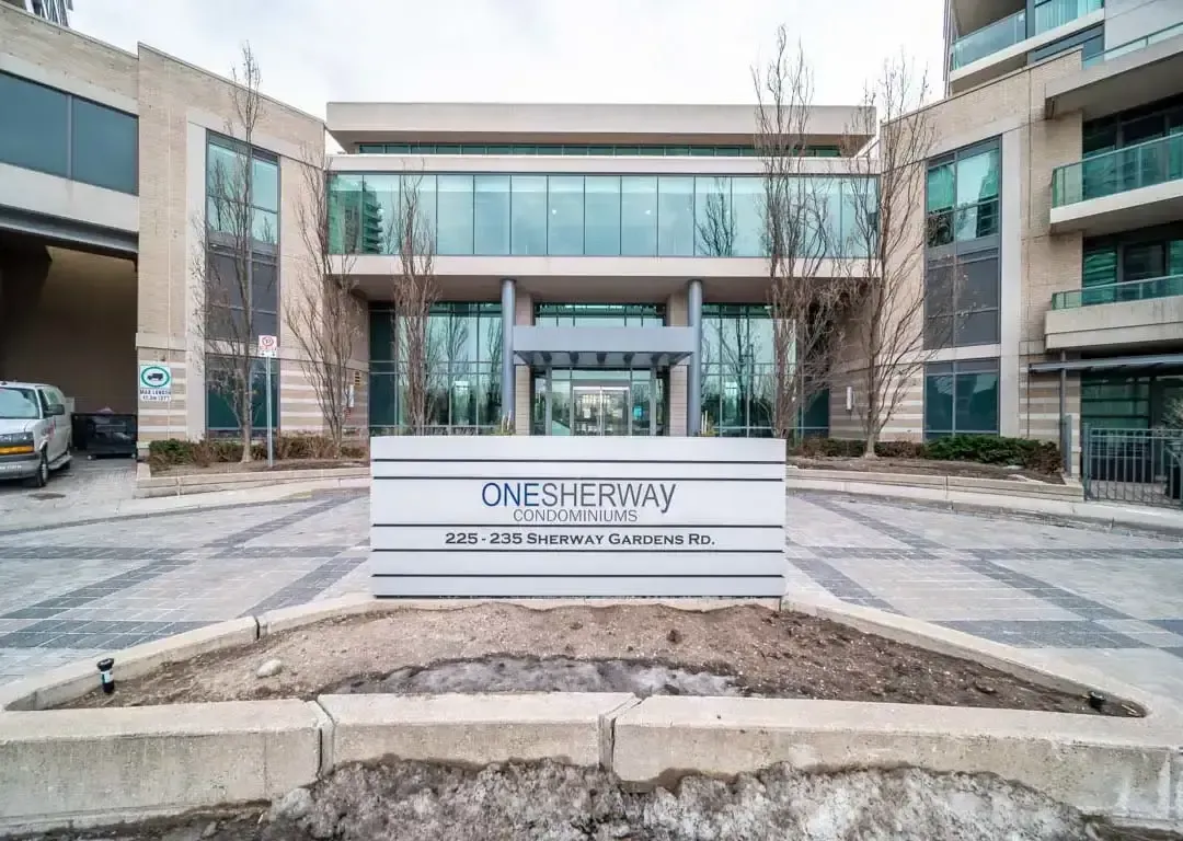 Building signage and exterior glass facade of One Sherway at 235 Sherway Gardens Rd.