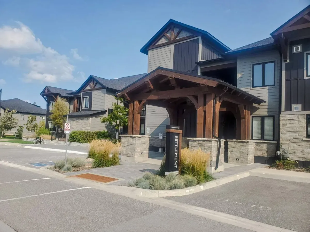 Modern stone and wood architectural details of the Mountain House complex at 11 Beausoleil #105.