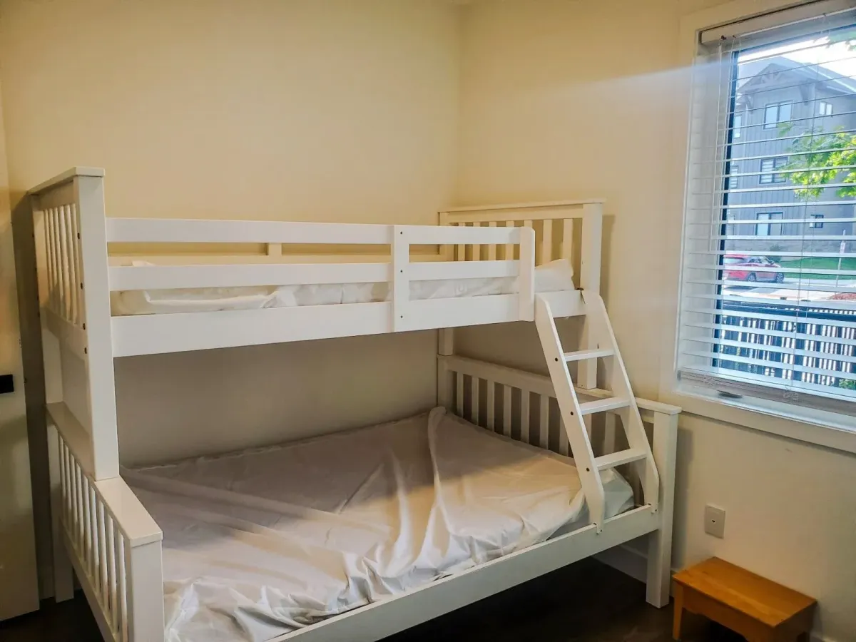 Detailed view of the bunk beds in the second bedroom at 11 Beausoleil #105, perfect for guests or children.