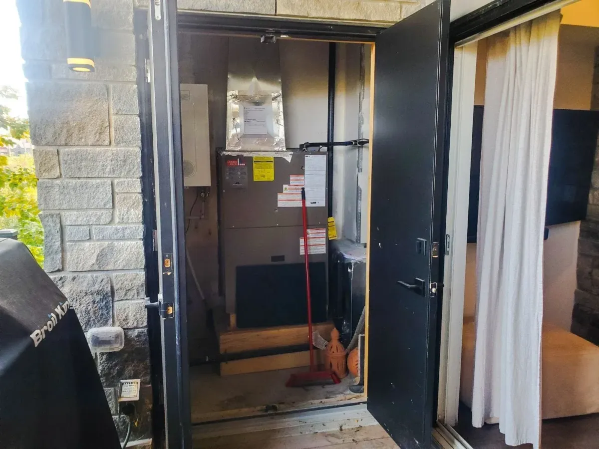 Open balcony doors at 11 Beausoleil #105 showing the seamless indoor-outdoor living flow.