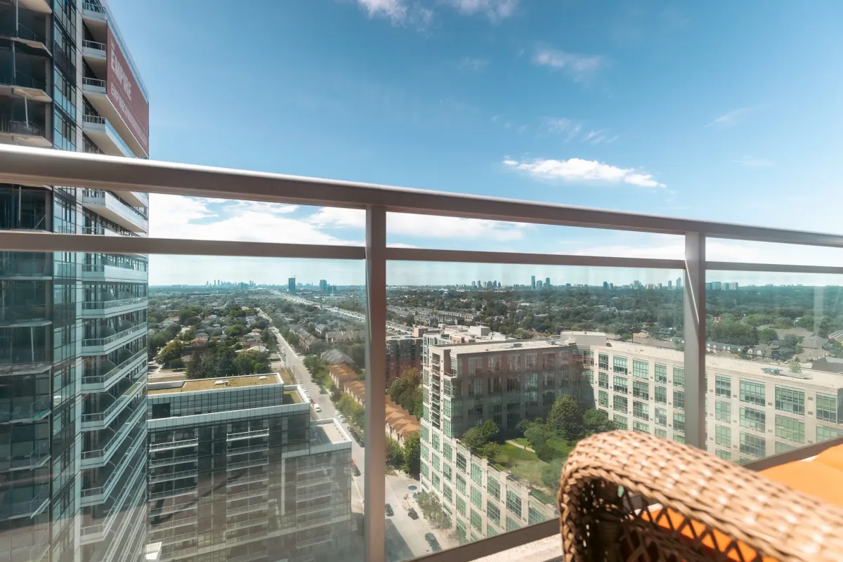 Outdoor balcony view at 155 Legion Rd N #2311, ideal for enjoying sunsets over the city.
