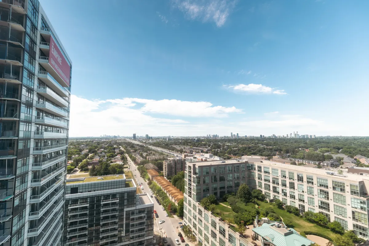 Sky-high perspective from 155 Legion Rd N #2311 showing the proximity to Lake Ontario and transit corridors.