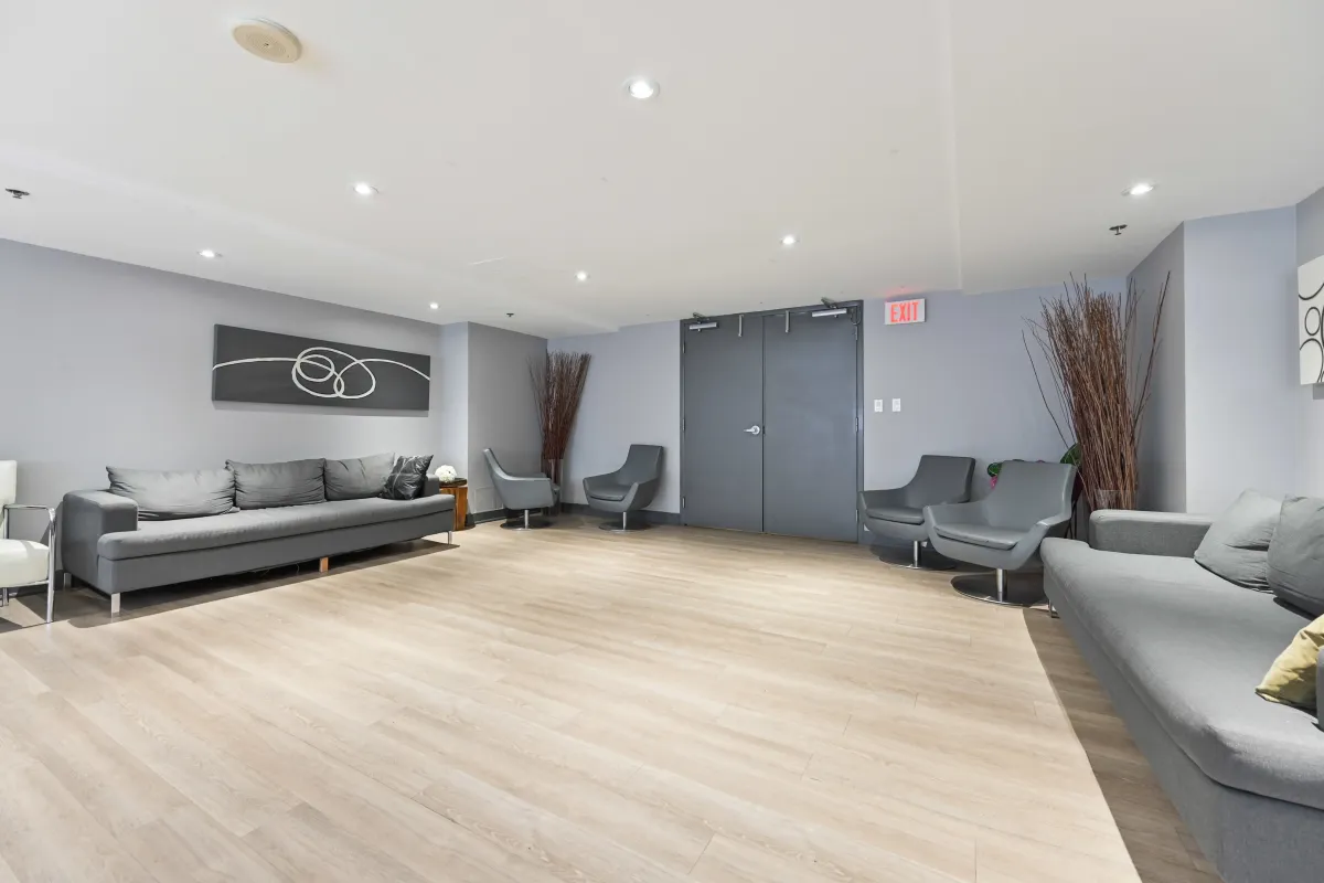 Modern community room and social space within the beBloor condos at 1369 Bloor St W, Suite 1416.