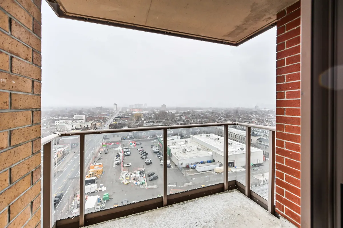 Private balcony at 1369 Bloor St W, Suite 1416, offering breathtaking and unobstructed panoramic views of the Toronto Downtown skyline.