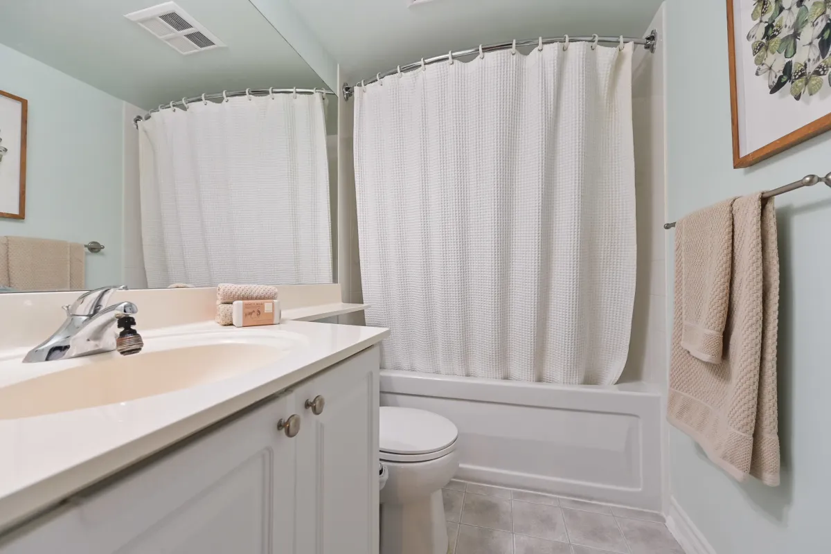 Clean and modern 4-piece bathroom at 1369 Bloor St W, Suite 1416, featuring neutral tones and updated fixtures.