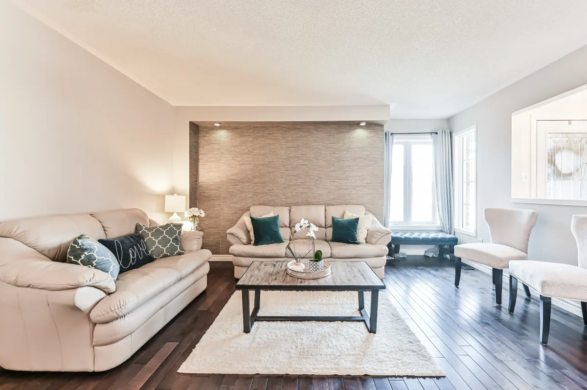 Open-concept dining and living area at 133 Howard Crescent, perfect for family meals and daily life.