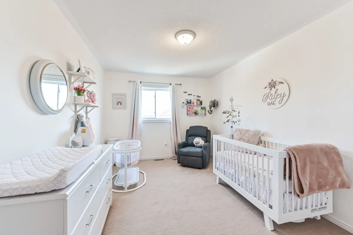 Second bright bedroom at 133 Howard Crescent, perfect for a child’s room or guest space.